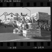 East Los Angeles Christmas parade, Olympic Torch runners float, Los Angeles, Calif., 1984