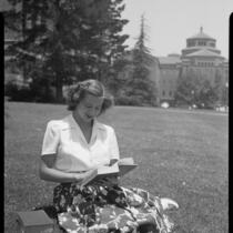 Mrs. Joe Raymond near Powell Library, University of California, Los Angeles, 1946