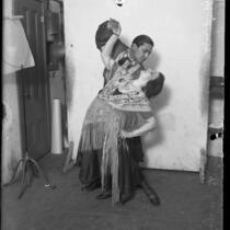 Gaby Arnold and Ernesto Sanchez posing in costume, circa 1920