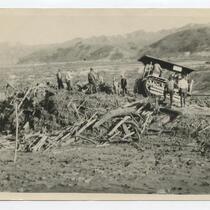 Workers and tractor on weathered land, Harry Carey Ranch, Los Angeles, March, 1928