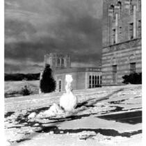 Snowfall on campus - Snowman in front of Education Building (Moore Hall), 1932.