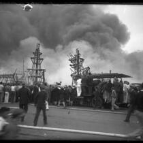 Spectators watching fire at 1929 Los Angeles Auto Show