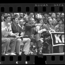 UCLA basketball coach, John Wooden courtside during game, 1971