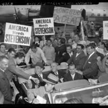 Supporters surrounding U.S. presidential candidate Adlai Ewing Stevenson, riding in automobile during campaign in Los Angeles, Calif., 1952
