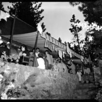Alumni event at Lake Arrowhead - Drinks on the porch, 1944