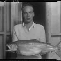 Young man with trout, Lake Arrowhead, 1929