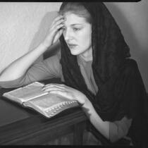 Betty Hanna in mantilla with Bible, 1941
