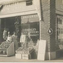 Workers in front of Garner's Grocery, Los Angeles