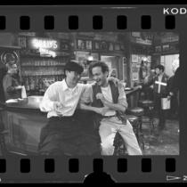 Actors Gedde Watanabe and Ned Eisenberg on set of television series 