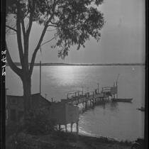 View towards narrow dock and three small boat, Morro Bay, 1929