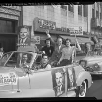 Young Republicans and Wallace Braden riding in cars covered with campaign signs in Los Angeles, Calif., 1948