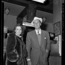 Actor Errol Flynn and wife LiLi Damita at Los Angeles airport, 1941