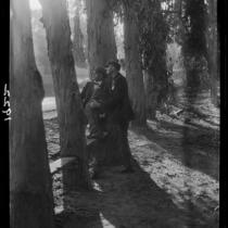 Adelbert Bartlett and another man among eucalyptus trees, Laguna Beach, 1925