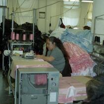 Garment Worker Making Dresses