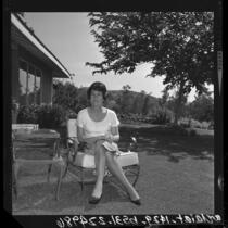1964 Republican National Convention Hostess and California committeewoman, Patricia Hitt sitting in yard of her Villa Park home