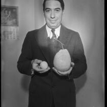 Attorney George Stahlman, photographed holding a Ponderosa lemon.