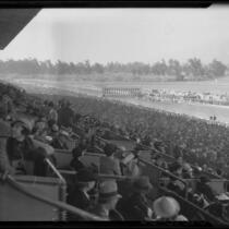 Box seat view of horses leaving the starting gate at Santa Anita Park, Arcadia, 1936