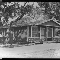 Cottage or cabin in an unidentified mountain or rural location, California, circa 1915-1930