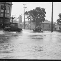 Intersection flooded during rainstorm, [Los Angeles County?], 1926