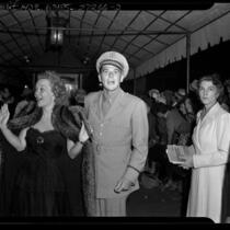Actors Jane Wyman and Ronald Reagan arriving at the  