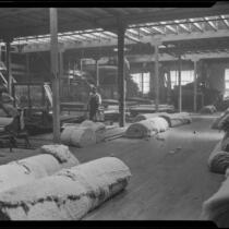Rolls of batting for upholstery at the Roberti Brothers' furniture factory, Los Angeles, circa 1920-1930