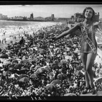 Montage of Thelma Peairs, Miss Venice, above crowded Venice beach, Venice, 1928