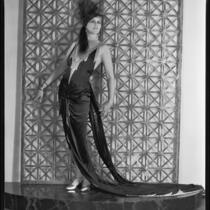Peggy Hamilton modeling a Max Rée gown worn by actress Maria Corda in the movie Love and the Devil, 1929