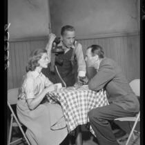 Actors Lauren Bacall, Humphrey Bogart and Henry Fonda in scene from television broadcast play 