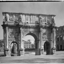Arch of Constantine, view from the south with the Colosseum in the background, Rome, Italy, 1929