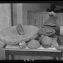 Grinding stones, pestles, and seashells, near Saddle Peak in Los Angeles, or Malibu, 1929