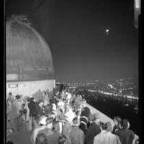 Crowd watching eclipse of the moon on balcony of Griffith Observatory, Calif., 1949