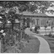 A. G. Mersy residence, back yard with rose standards and lawn, Pasadena, 1933