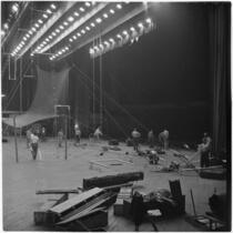 Members of the Polack Bros. Circus set up for their show inside Shrine Auditorium, Los Angeles, June 1946