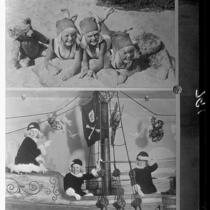 Mawby triplets lying in sand and playing on pirate boat, Santa Monica, 1929