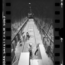 Workmen in cavern at nuclear waste disposal site in Mercury, Nevada, 1980