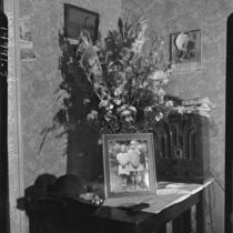 Shrine for murder victims Madeline and Melba Everett in their home, Inglewood, 1937