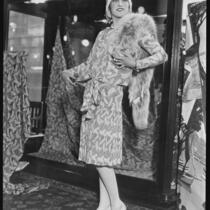 Peggy Hamilton modeling a dress and fur stole, Chicago, 1929