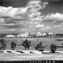 Distant view of campus with Gayley Avenue in foreground, 1937