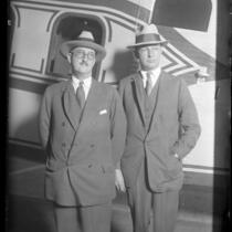 William E. Boeing and Fred Rentschler standing in front of an airplane, 1929