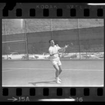 Actor-singer Ricky Nelson playing in the 30th annual Motion Picture Tennis Association Tournament in Encino, Calif., 1964