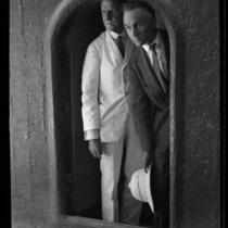 Adelbert Bartlett and Ed Blatchford looking through an arch, Jerusalem, 1925