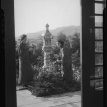 Women and pillar at Bernheimer Gardens, Pacific Palisades, 1927-1940