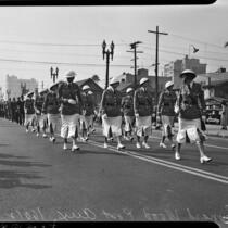 Members of the Leonard Wood Post Auxiliary march in the Armistice Day Parade, Los Angeles, November 11, 1937