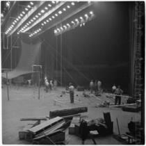 Members of the Polack Bros. Circus set up for their show inside Shrine Auditorium, Los Angeles, June 1946