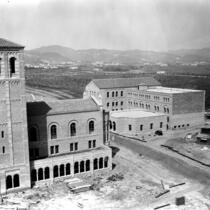 Royce Hall and Chemistry Building (Haines Hall) under construction, 1928