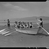 Santa Monica College Women's Row-A-Way Club in boat on beach, Santa Monica, 1935