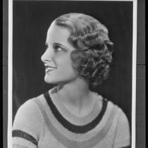 Actress Florine McKinney modeling a Weaver Jackson salon hairstyle, circa 1932-1933