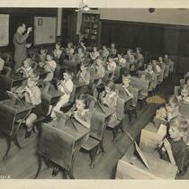 Elementary school children during music lesson.