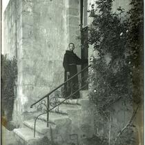 Priest entering the side door to the chapel at Mission Santa Barbara, Santa Barbara, 1898