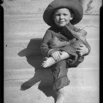 Child seated on steps, Los Angeles, circa 1935